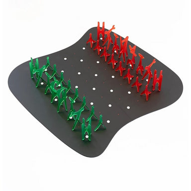 acrylic chess set with green and red pieces and black board top view