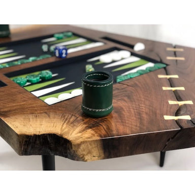 backgammon coffee table with live edge slab with green and white checkers close up corner view of bowties