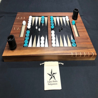 luxury backgammon board made with wood and leather with white a and turquoise checkers top view