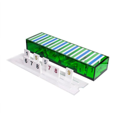 rummikub in acrylic with green box with stripes in blue, white, and green on top profile view